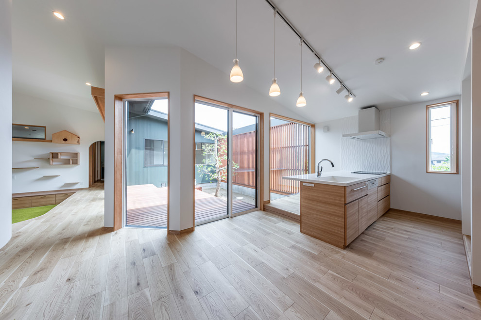 Medium sized scandinavian single-wall open plan kitchen in Other with an integrated sink, composite countertops, white splashback, ceramic splashback, plywood flooring, a breakfast bar, white worktops, medium wood cabinets, integrated appliances, brown floors and a wallpapered ceiling.