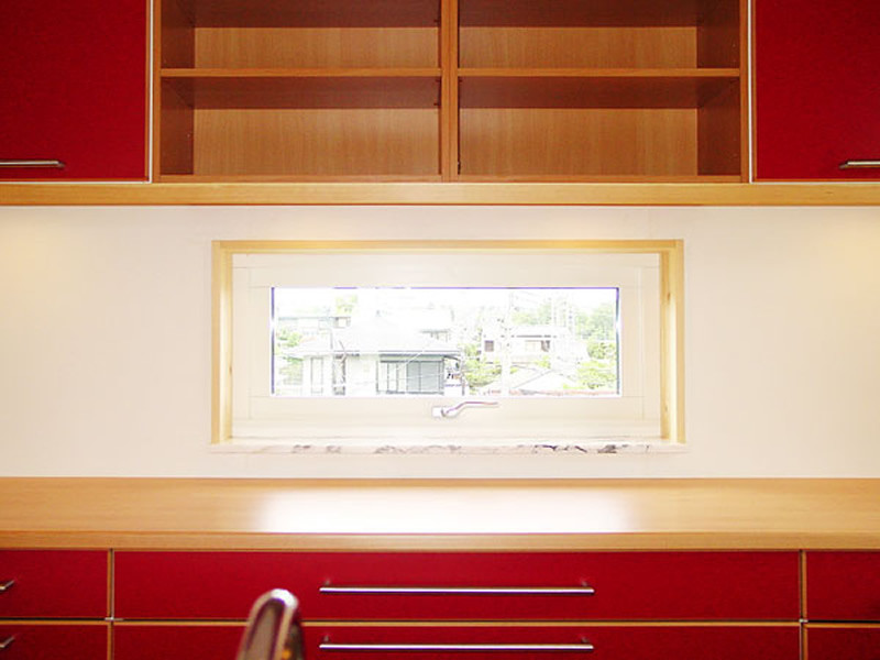 Design ideas for a medium sized scandinavian single-wall open plan kitchen in Kobe with red cabinets.