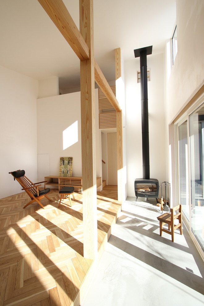 Immagine di una veranda minimalista con pavimento in cemento, soffitto classico e pavimento grigio