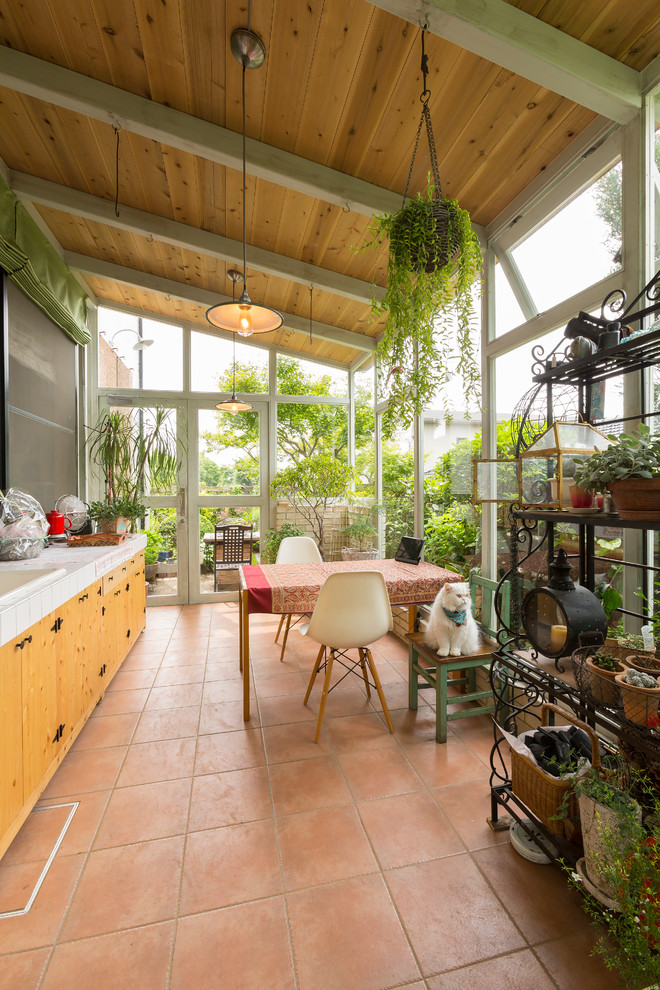 This is an example of a rustic conservatory in Other.