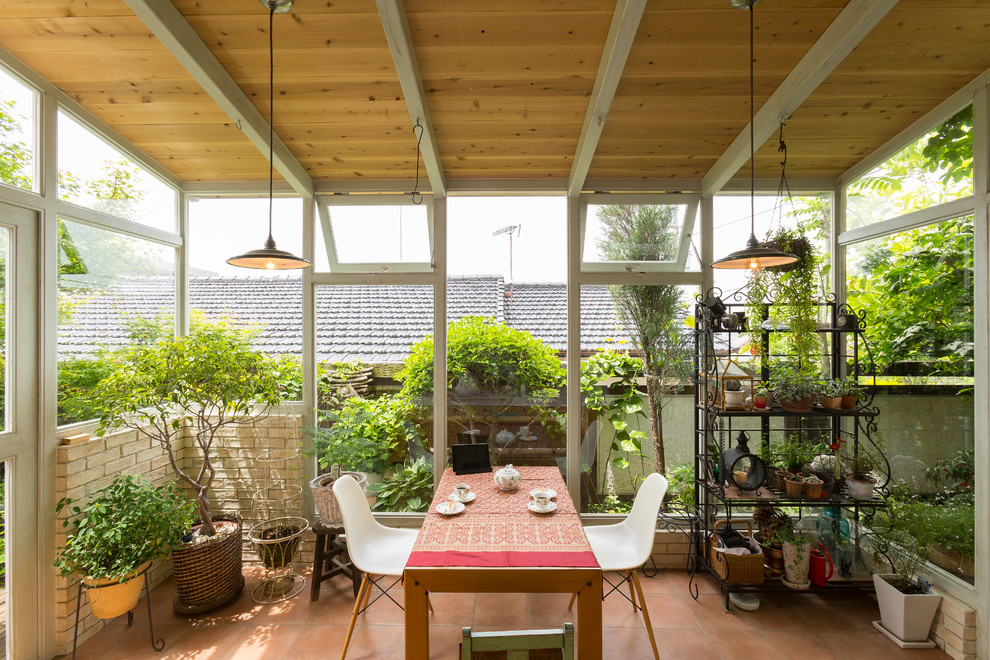 Small farmhouse conservatory in Other with no fireplace and a standard ceiling.