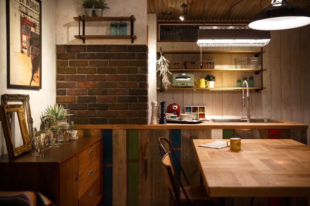 This is an example of an industrial dining room in Other.