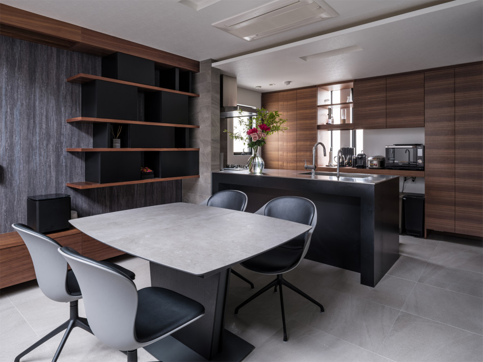 Trendy gray floor kitchen/dining room combo photo in Tokyo with gray walls