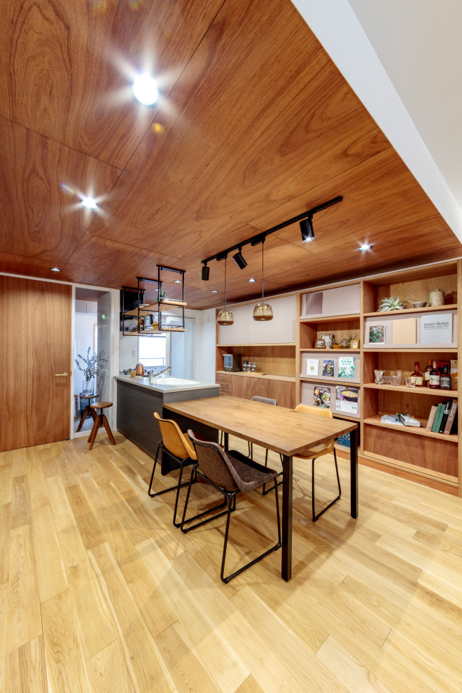 Inspiration for a small midcentury open plan dining room in Other with white walls, light hardwood flooring, beige floors and a timber clad ceiling.