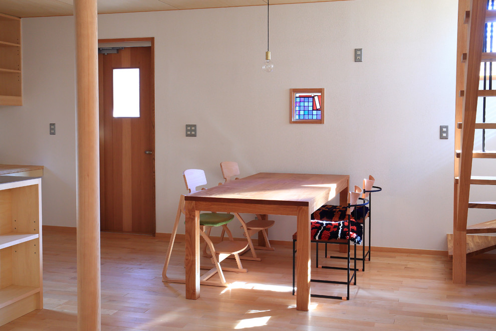 Minimalist light wood floor, beige floor and wood ceiling great room photo in Nagoya with white walls