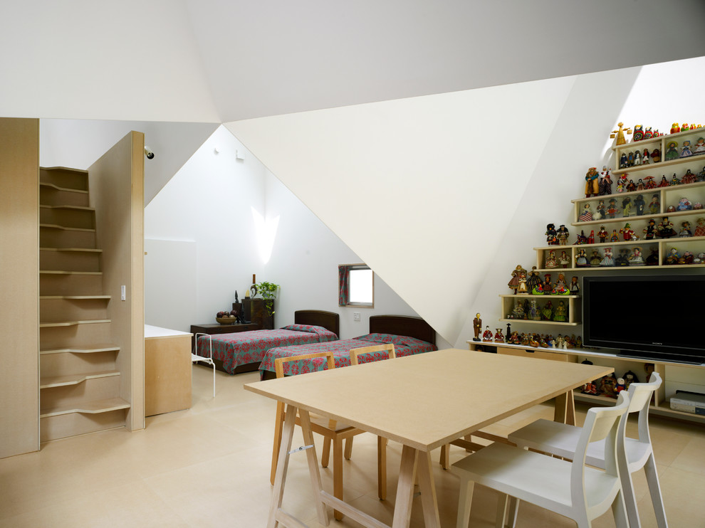 This is an example of a world-inspired open plan dining room in Tokyo with white walls and light hardwood flooring.