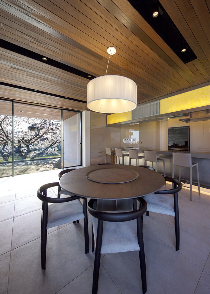 Dining room - modern dining room idea in Osaka