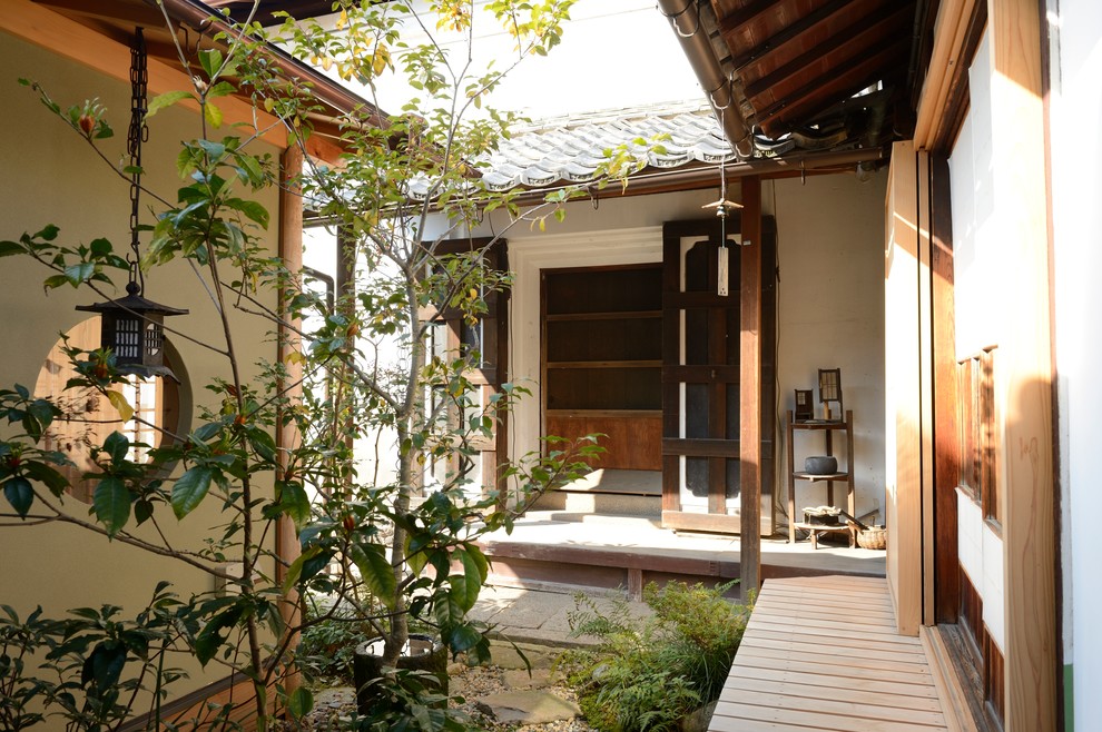 Foto de patio de estilo zen sin cubierta en patio con entablado