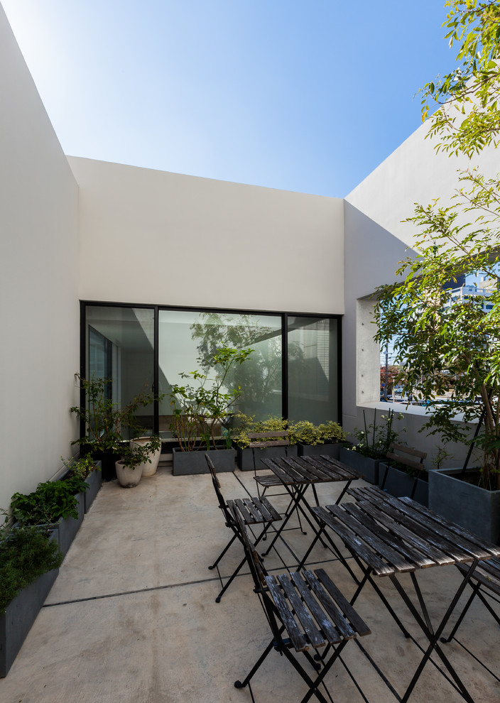 Idee per un patio o portico design in cortile con nessuna copertura