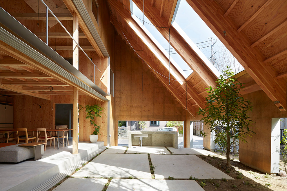 Inspiration pour une terrasse design avec une cuisine d'été et une cour.