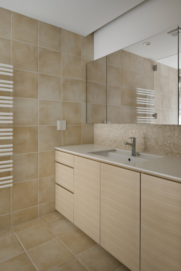 Inspiration for a modern cloakroom in Other with beaded cabinets, beige cabinets, beige tiles, mosaic tiles, beige walls, ceramic flooring, a submerged sink, engineered stone worktops, beige floors and white worktops.