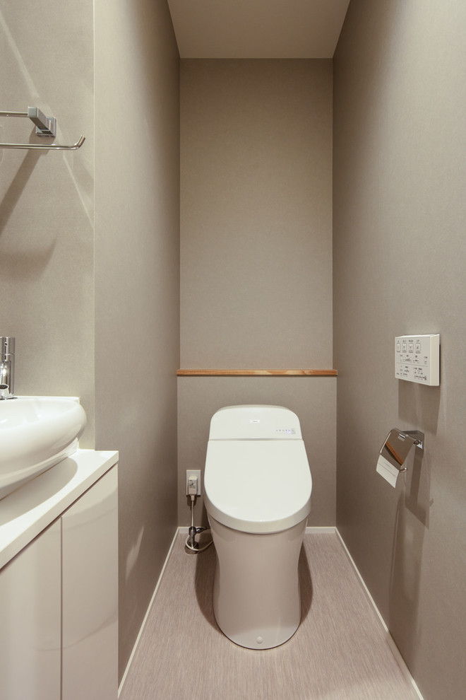 Inspiration pour un petit WC et toilettes minimaliste.