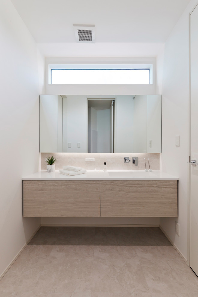Design ideas for a cloakroom in Other with white cabinets, white walls, marble worktops, beige floors, white worktops, a built in vanity unit, a wallpapered ceiling and wallpapered walls.