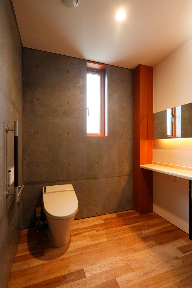 Inspiration for a modern powder room remodel in Sapporo