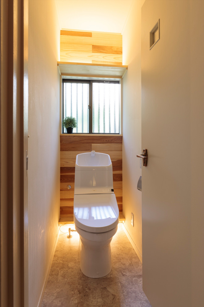 Inspiration for a small modern cloakroom in Other with a one-piece toilet, white walls, lino flooring and grey floors.