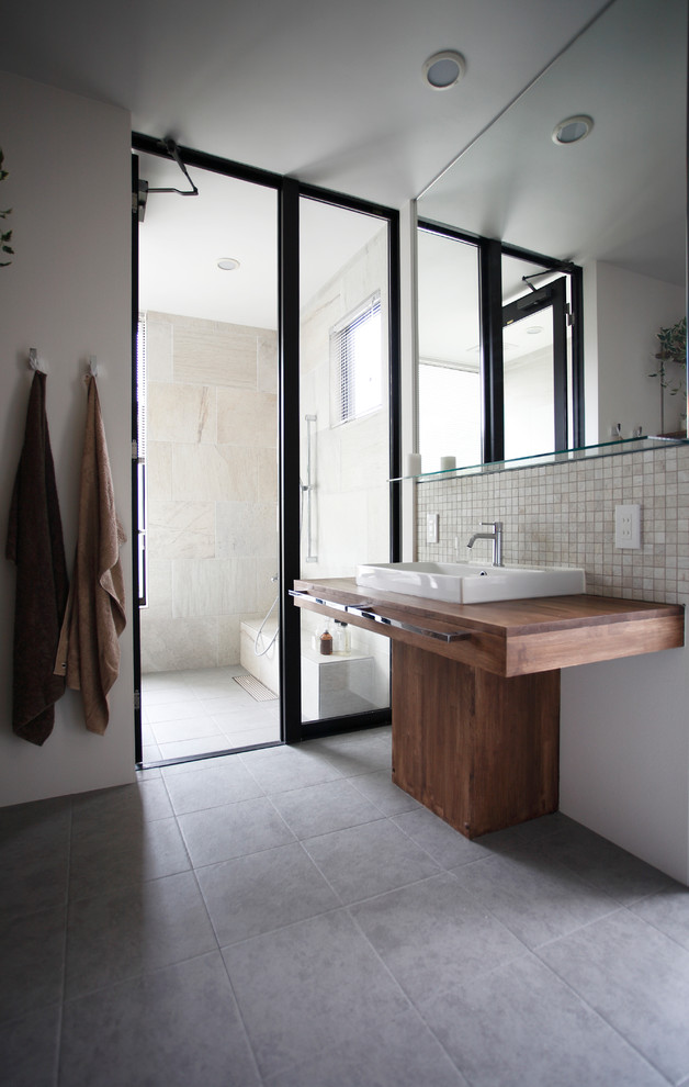 Example of a minimalist powder room design in Other