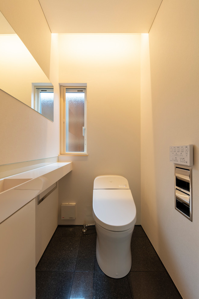 Idée de décoration pour un WC et toilettes minimaliste.