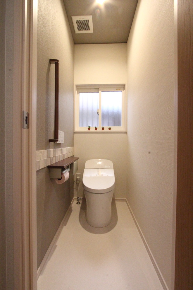 Example of a minimalist powder room design in Other