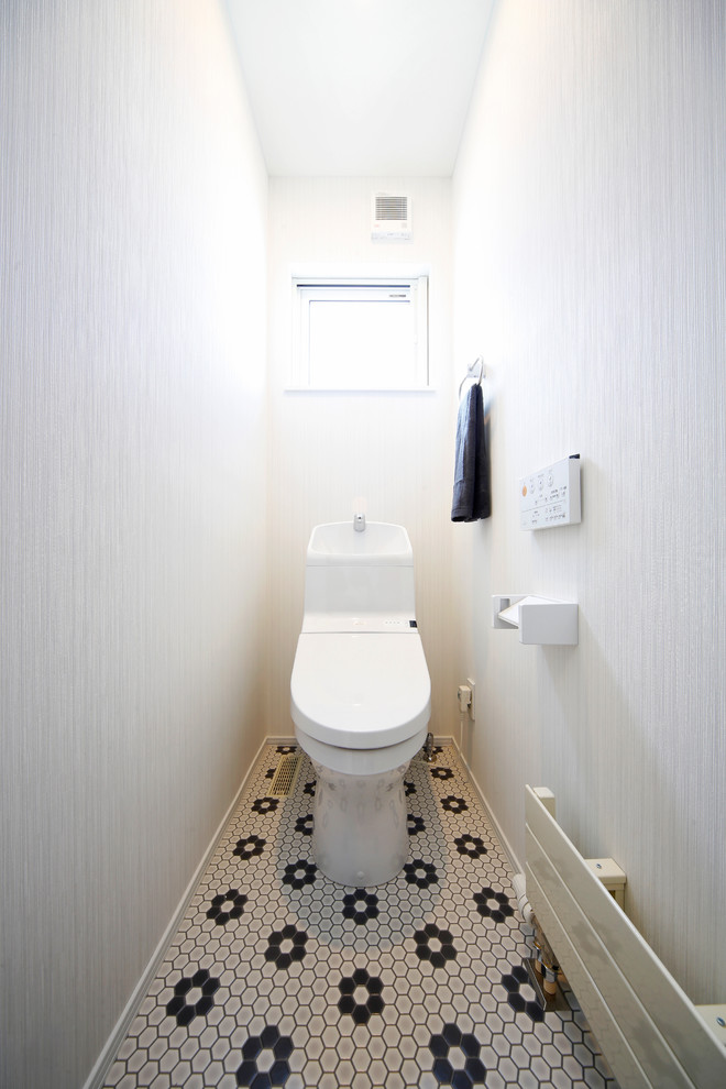 札幌にあるミッドセンチュリースタイルのおしゃれなトイレ・洗面所の写真