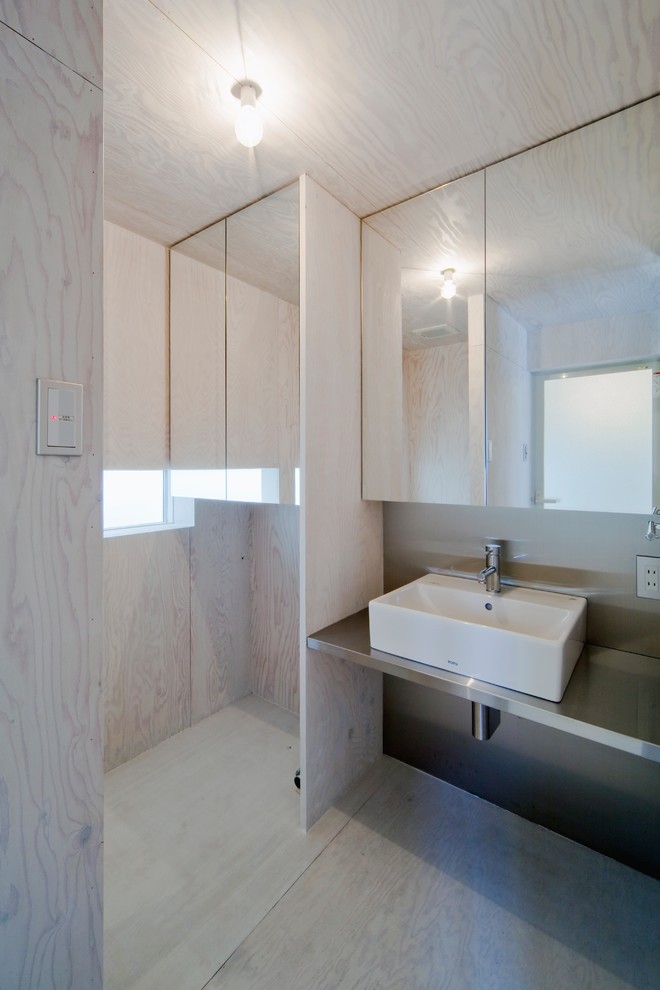 大阪にあるラスティックスタイルのおしゃれなトイレ・洗面所の写真