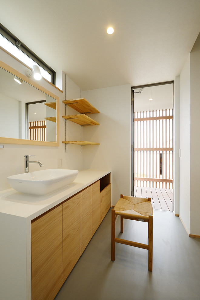 Photo of a scandi cloakroom in Other with white walls and white worktops.