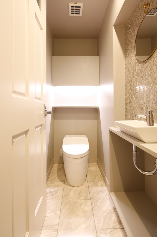 Example of a danish powder room design in Other