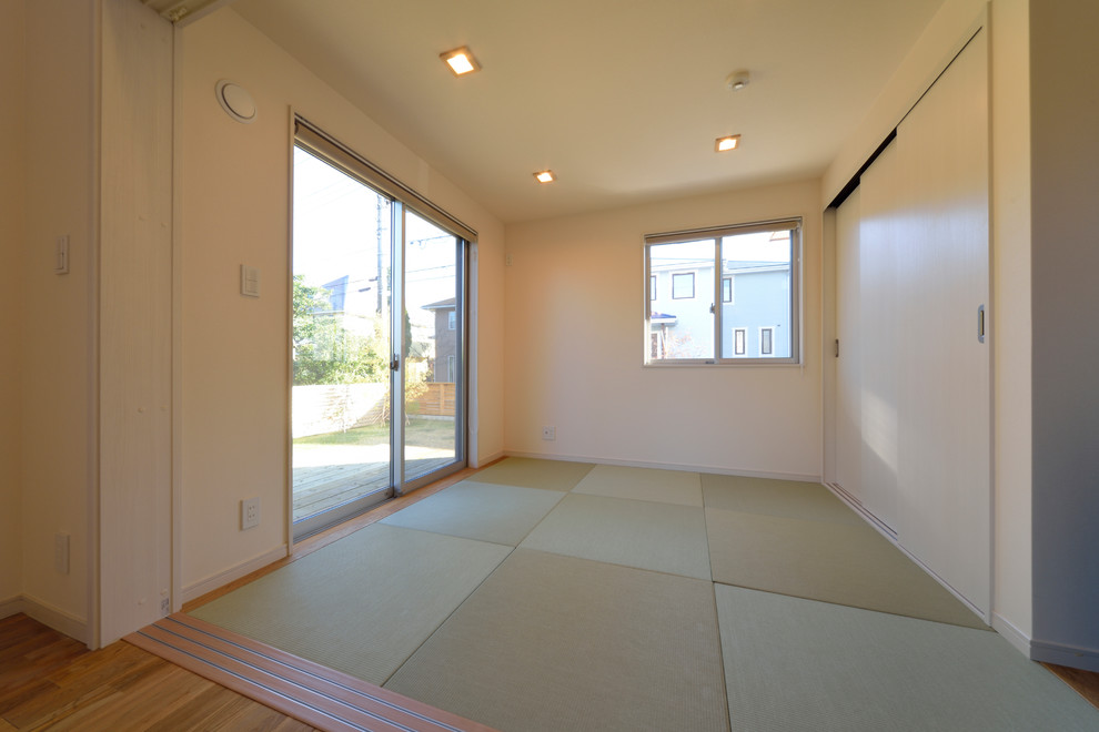 Esempio di un soggiorno etnico con pavimento in tatami