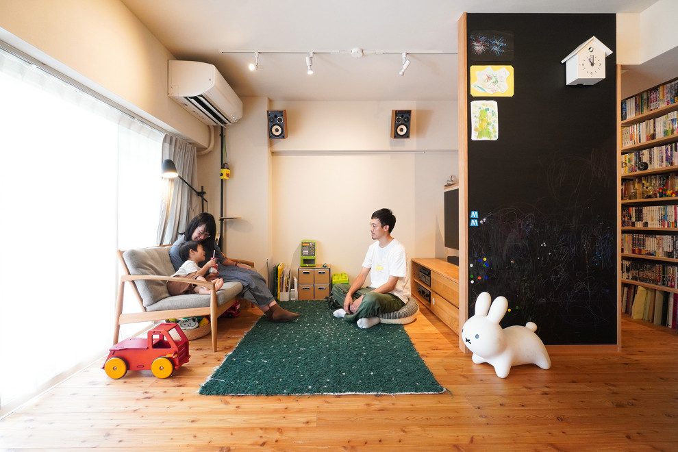 東京都下にある北欧スタイルのおしゃれなファミリールームの写真