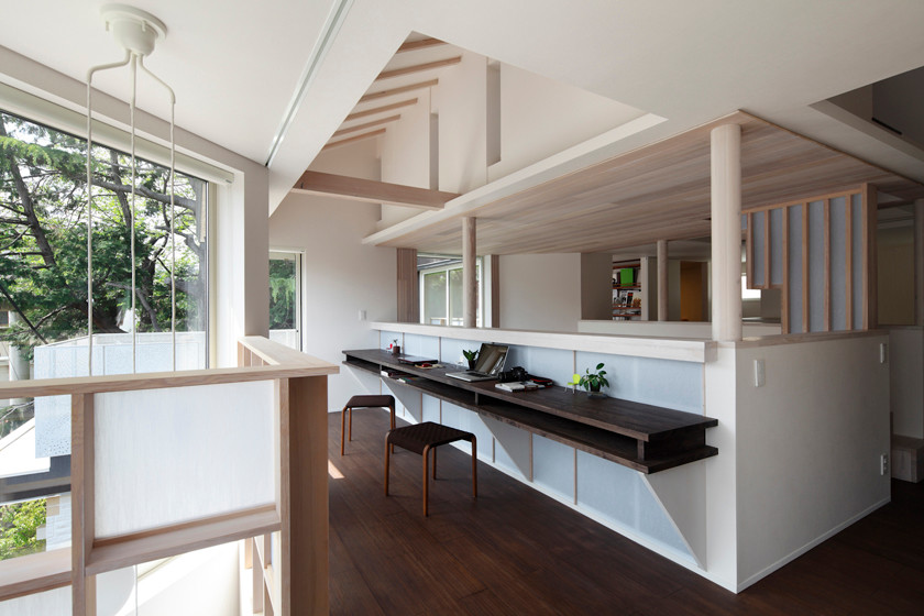 Inspiration for a mid-sized shabby-chic style brown floor family room library remodel in Tokyo with white walls and no tv