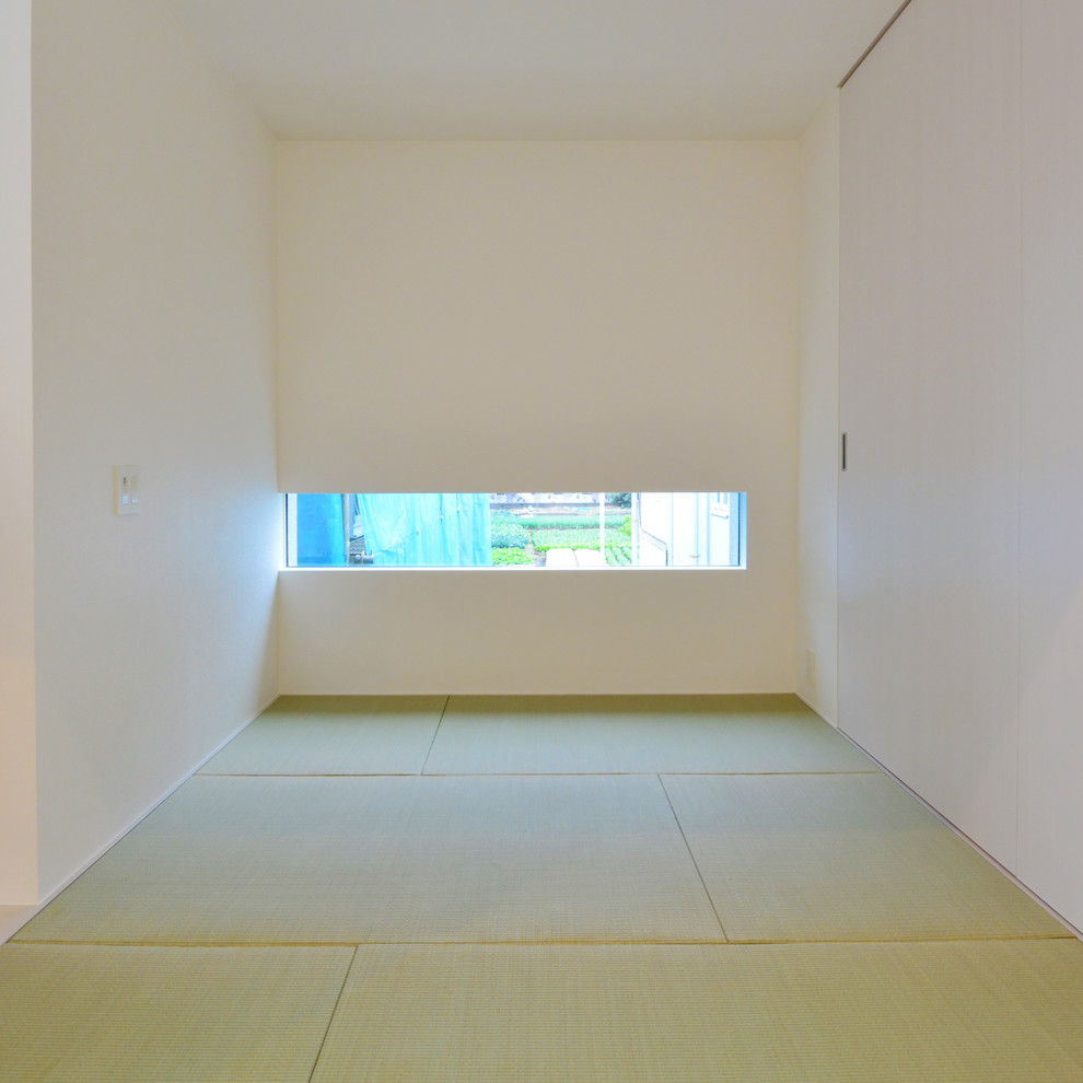 東京23区にあるモダンスタイルのおしゃれなファミリールームの写真