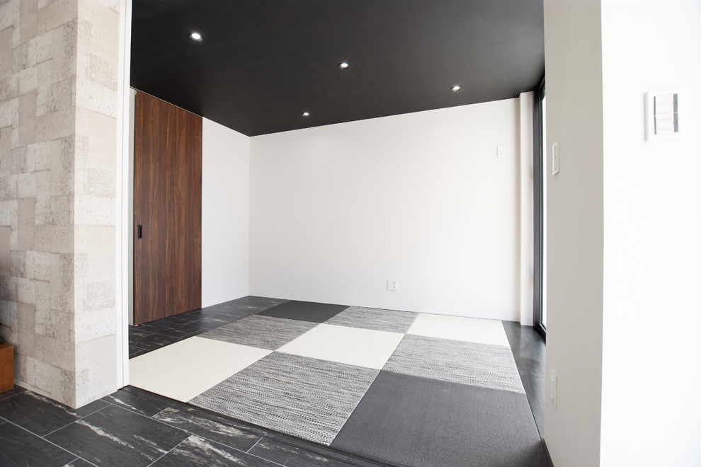 Idee per un soggiorno moderno con pareti bianche, pavimento in tatami, nessun camino, nessuna TV e pavimento nero