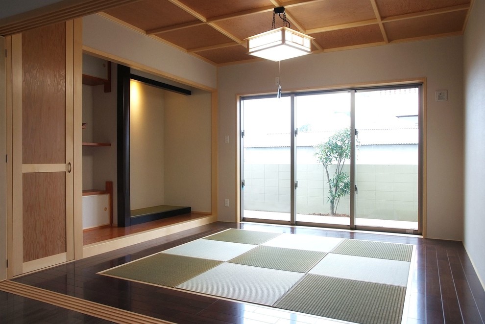 Inspiration pour une salle de séjour design avec un sol de tatami.