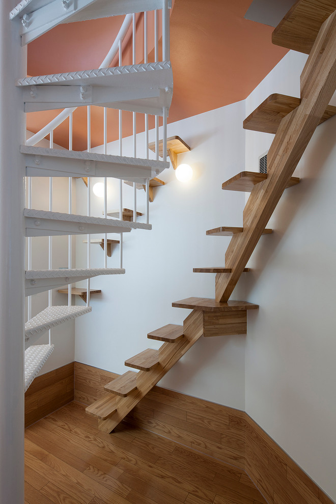 Staircase - mid-century modern staircase idea in Tokyo