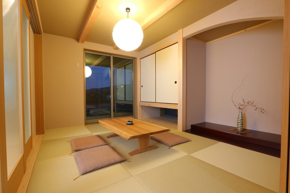 Inspiration for an asian tatami floor family room remodel in Other with beige walls