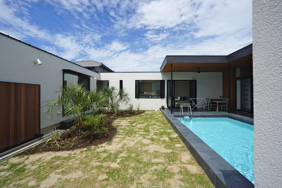 Diseño de piscina tropical rectangular