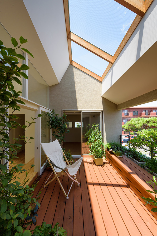 Foto di un balcone minimalista di medie dimensioni con parapetto in metallo
