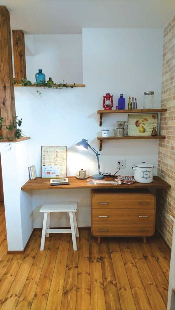 Inspiration for a farmhouse home office in Other.