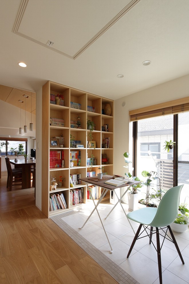 東京都下にあるアジアンスタイルのおしゃれなホームオフィス・書斎の写真