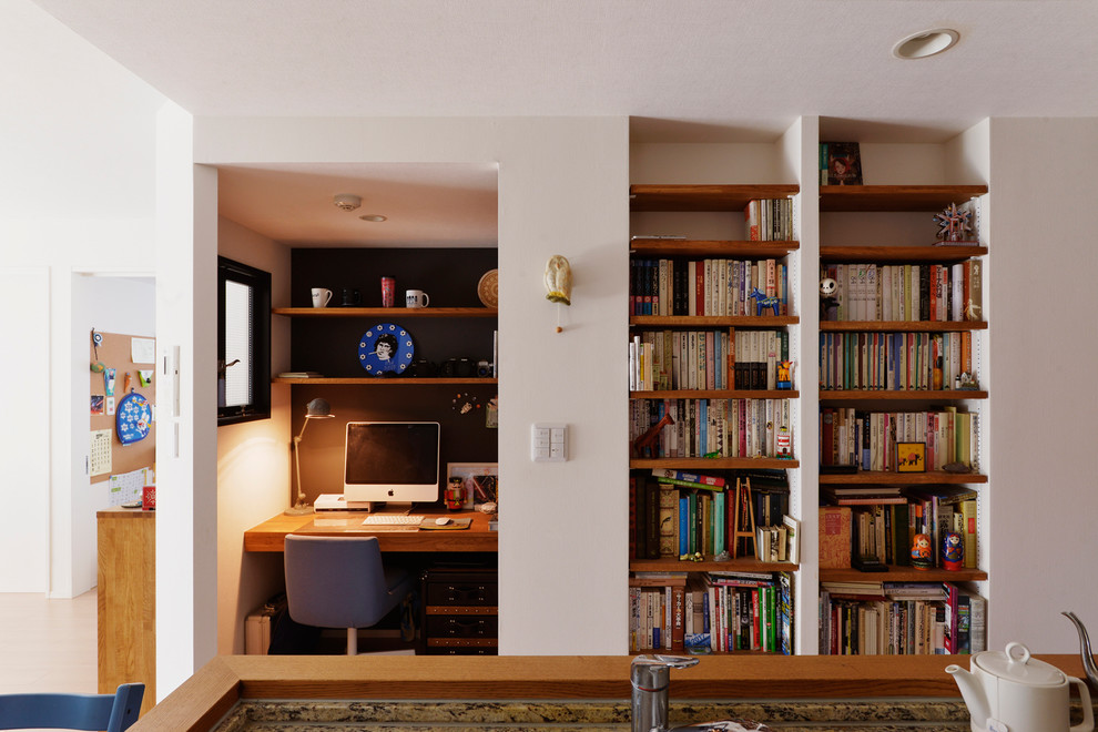 東京23区にあるミッドセンチュリースタイルのおしゃれなホームオフィス・書斎の写真