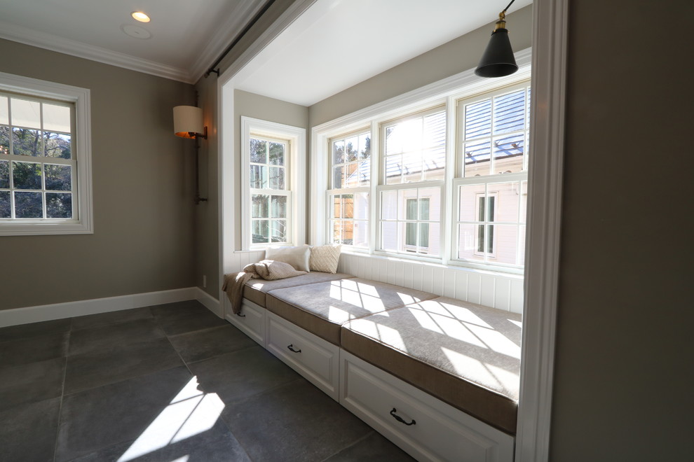 Foto på ett minimalistiskt vardagsrum, med beige väggar