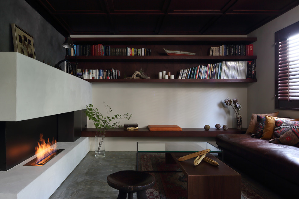 Idéer för orientaliska vardagsrum, med grå väggar och grått golv