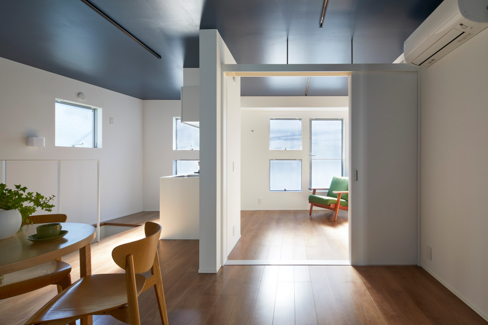 Living room - modern living room idea in Tokyo