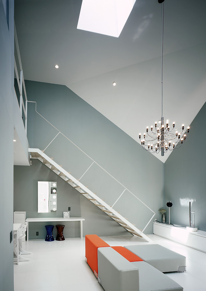 Idéer för ett modernt vardagsrum, med grå väggar