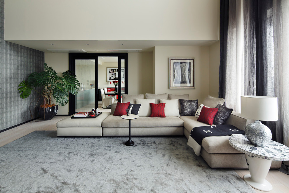 Ispirazione per un soggiorno minimal con pareti bianche e pavimento grigio
