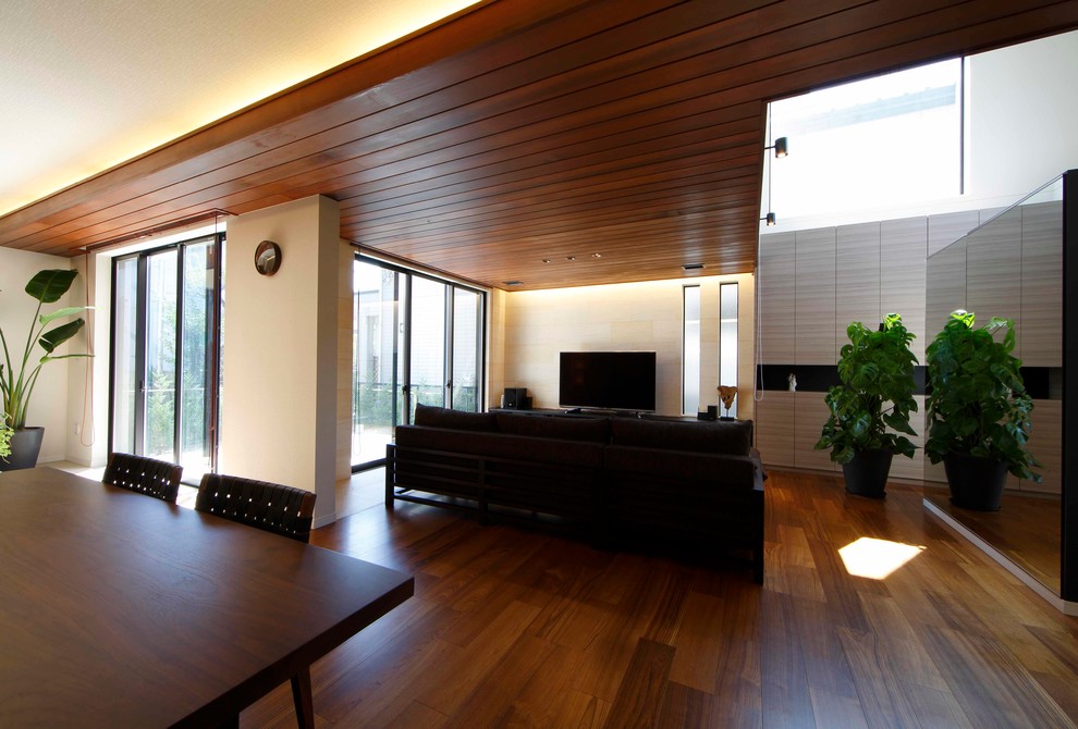 Living room - mid-sized formal and open concept light wood floor and brown floor living room idea in Tokyo with white walls, no fireplace and a tv stand