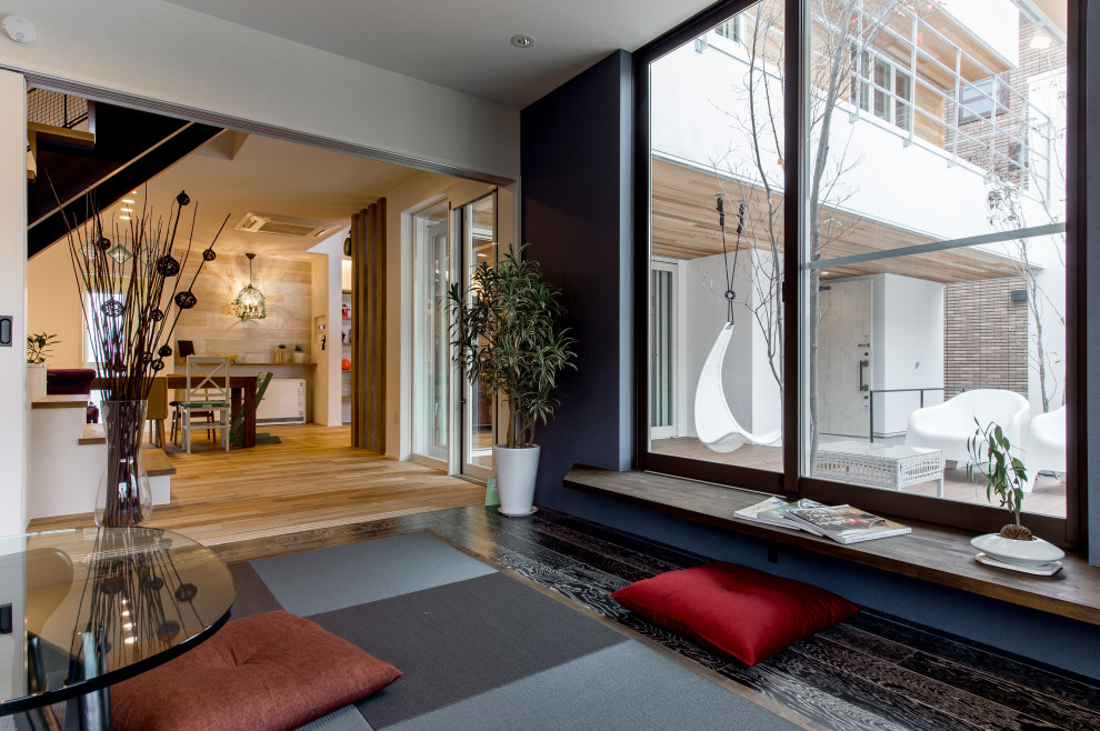 Ispirazione per un soggiorno con pavimento in tatami
