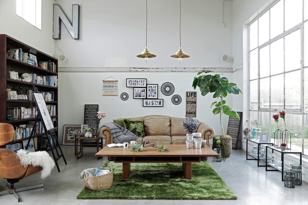 Design ideas for an eclectic living room in Other with white walls.