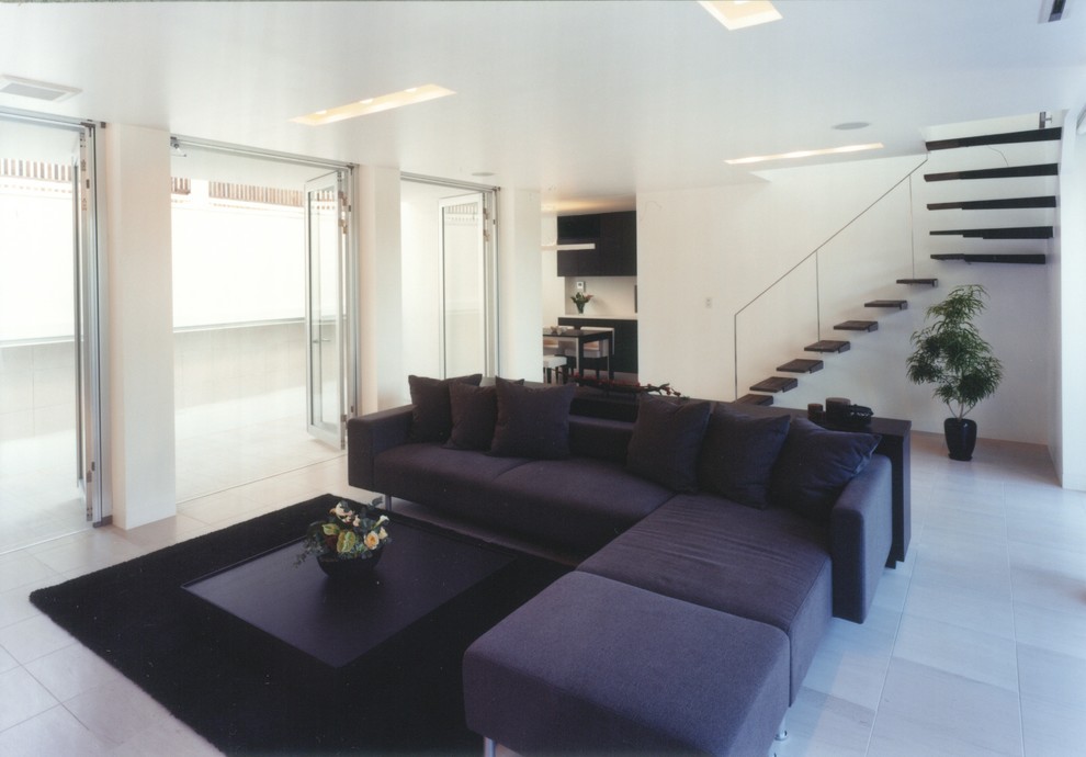 Living room - zen limestone floor living room idea in Other