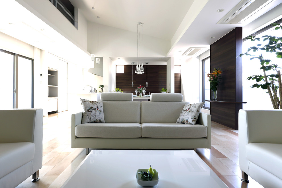 Inspiration for a modern painted wood floor and beige floor living room remodel in Tokyo Suburbs with white walls