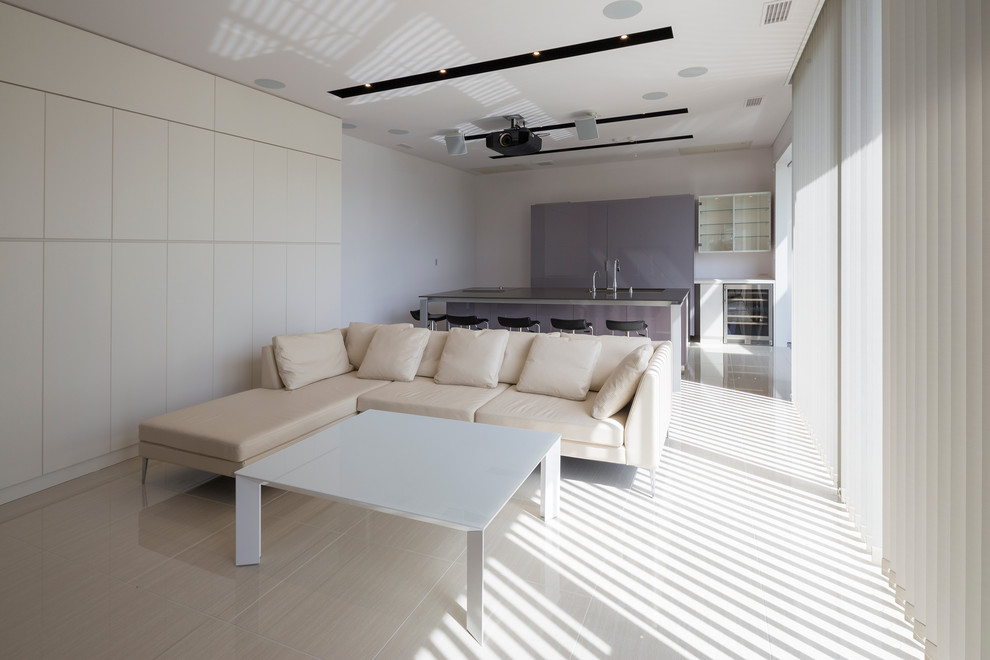 Example of a trendy open concept living room design in Osaka with white walls